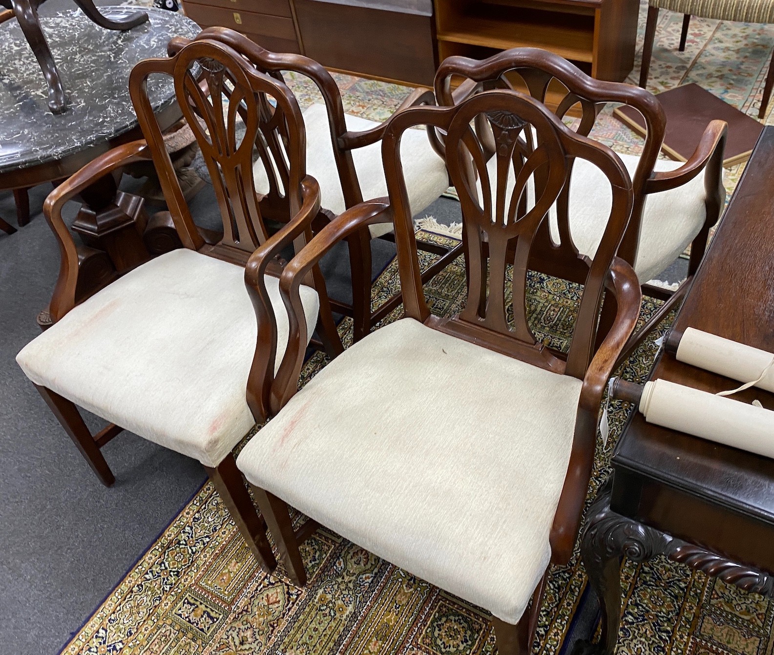 A set of ten George III style mahogany dining chairs